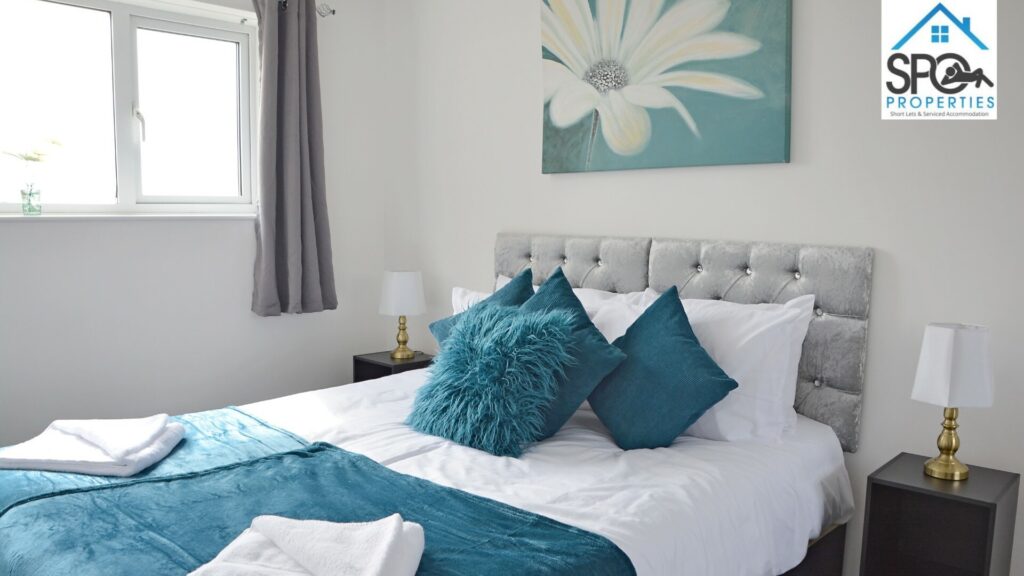Spacious bedroom with king/twin bed setup at contractor accommodation in Cwmbran.